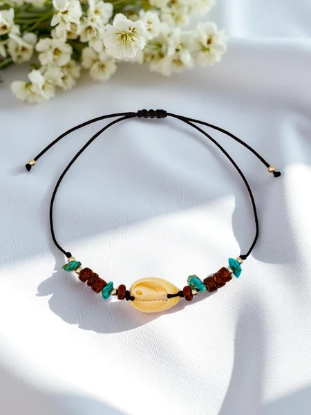 Naiste käevõru Okeaania merekarbiga Aeg