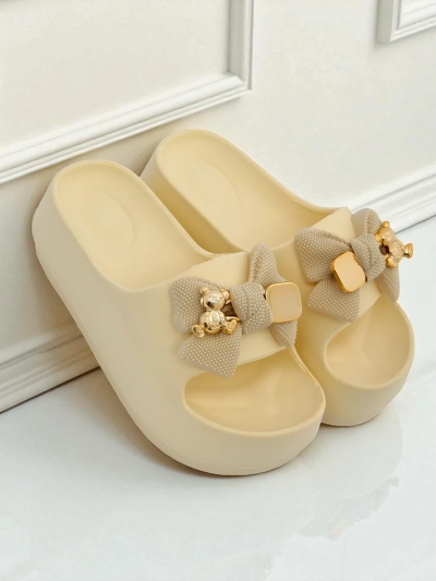 Royalfashion Women's rubber flip-flops with a decorative bow Alday
