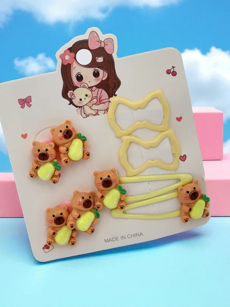 Set of hair clips with bear and bow motifs