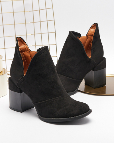 Women's boots on the post with cut-outs in black. Encura- Footwear