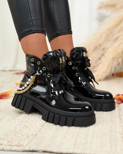 Royalfashion Women's lacquered insulated boots in black Dahaff