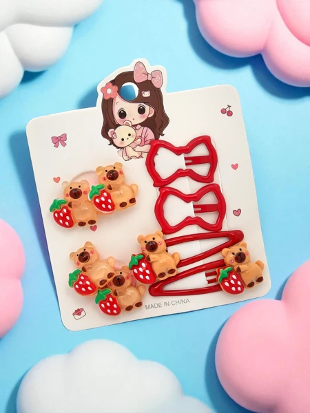 Set of hair clips with teddy bear and bow motifs