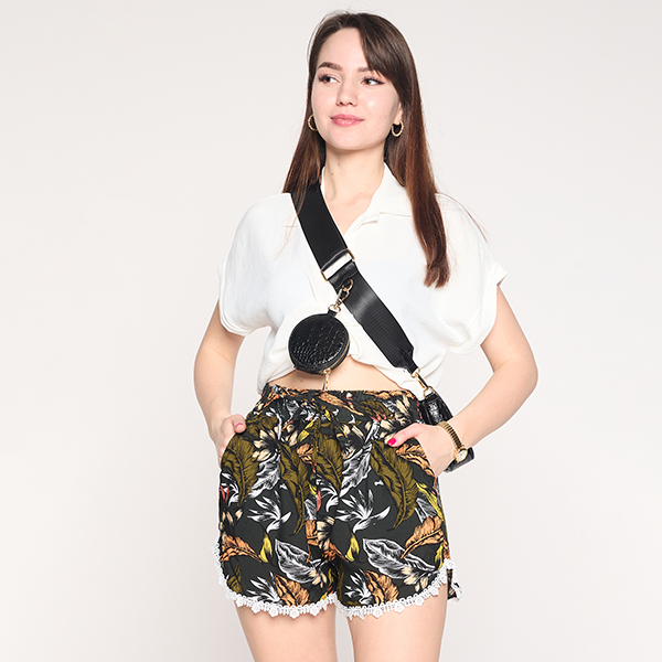 Black and orange women's shorts with a floral pattern - Clothing