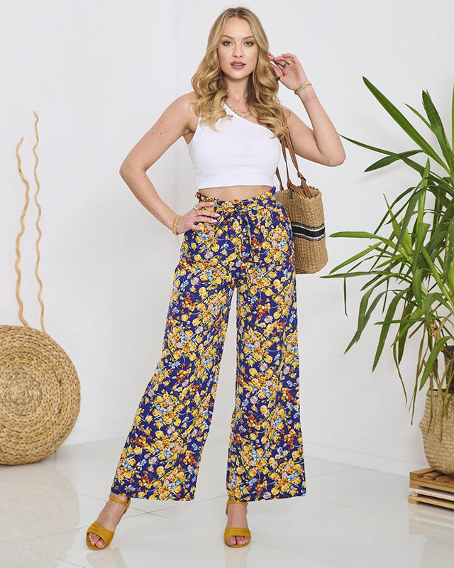 Naiste sinised palazzo püksid tumesiniste lilledega- Rõivad