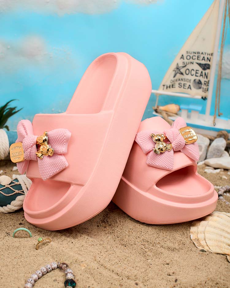 Royalfashion Naiste kummist flip-flopid dekoratiivse vibuga Nilm