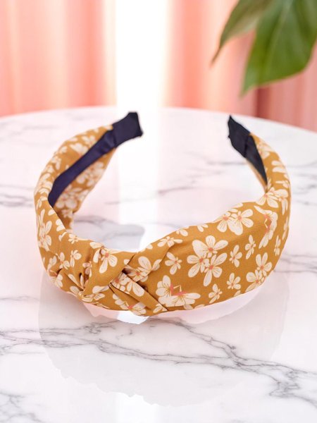 Royalfashion Hairband with braided floral pattern Florinda