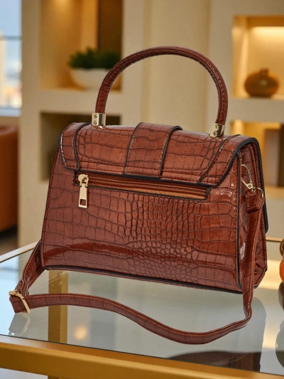 Lakitud väike naiste ökonahast käekott Lunaya