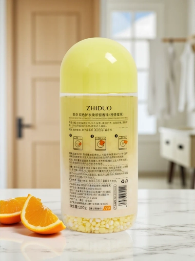 Scent booster beads for laundry with orange scent