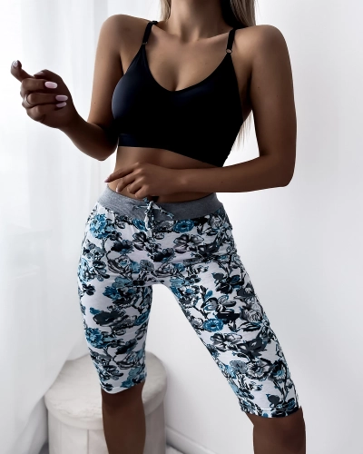 Naiste valged ja lillelised 3/4 lühikesed püksid PLUSS SUURUS - Riietus