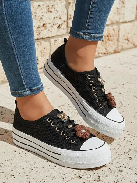 Royalfashion Women's perforated sneakers with decorations Osdo