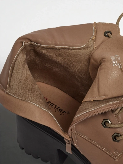 Naiste öko-seemisnahast platvormi ja paksu kontsaga poolsaapad Tavlissa